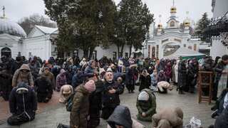Monks refuse to leave centuries-old Kyiv church over alleged links with Russia