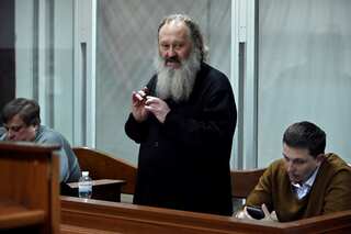 Ukrainian court puts Orthodox Church cleric with alleged Russia ties under house arrest