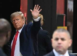 Ex-US president Trump arrives in New York to surrender in hush money case