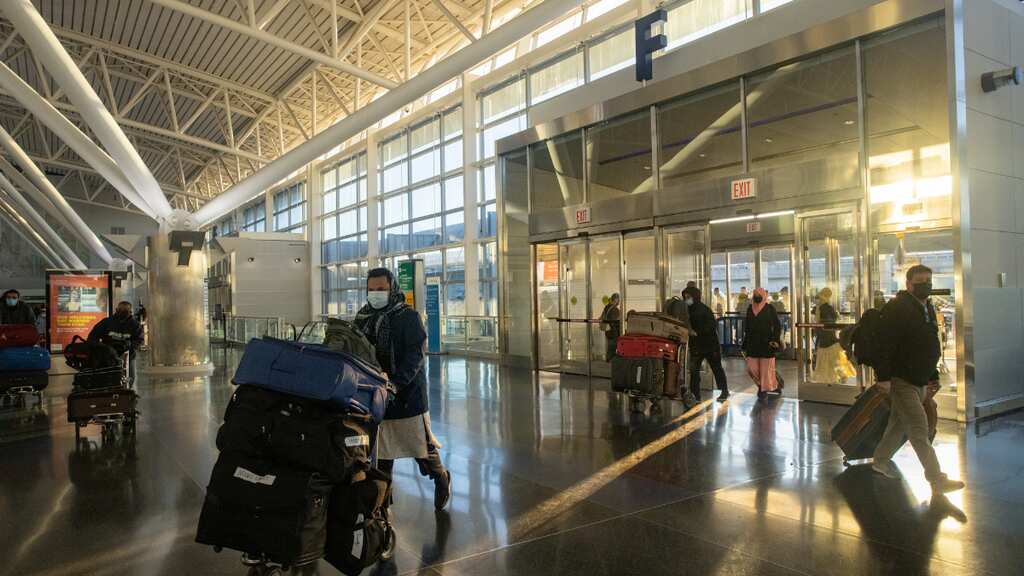 Two construction workers died at John F Kennedy airport after being buried under debris