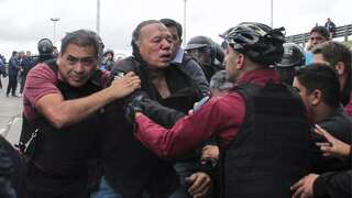 Watch: Argentinian minister gets broken jaw after furious bus drivers reject negotiations