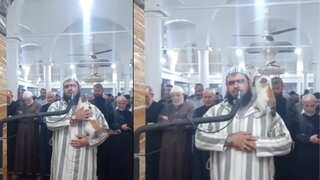 Watch | Cat jumps on imam as he continues to recite Ramadan prayers