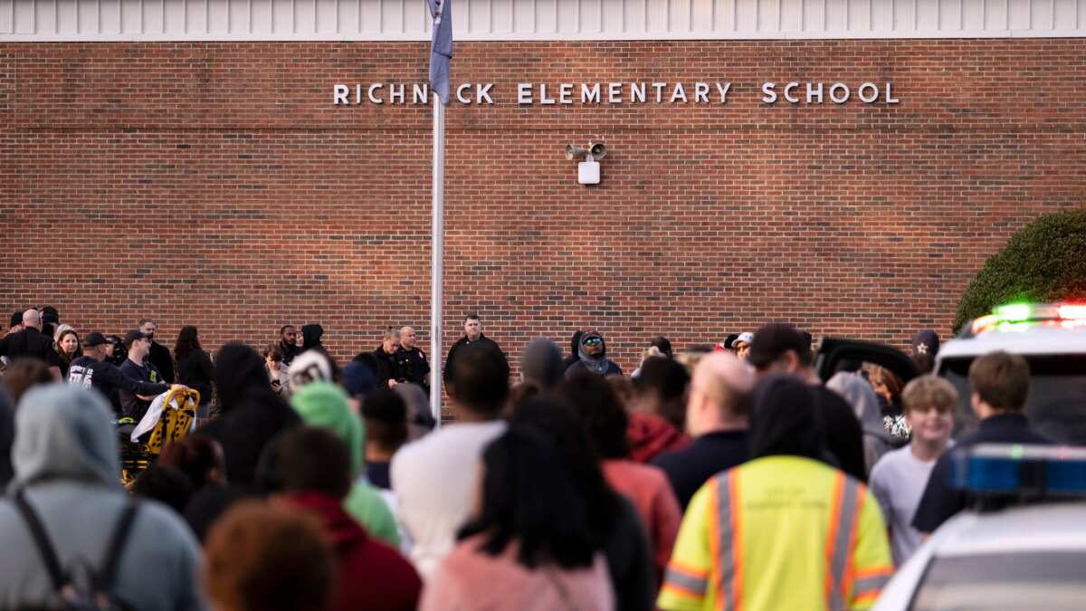 US: Mother of six-year-old who shot teacher charged with child neglect US: Mother of six-year-old who shot teacher charged with child neglect