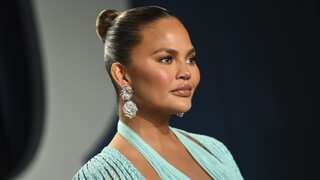 Chrissy Teigen gets candid about stretch marks and saggy breasts; shares pic with newborn baby Esti