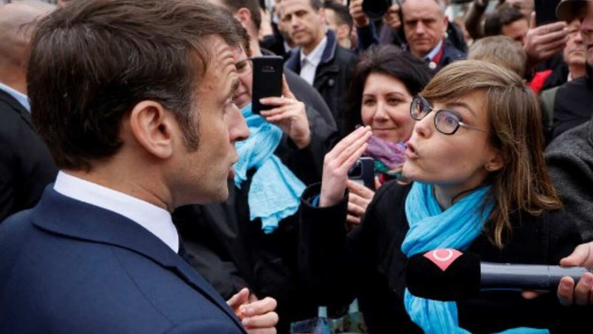 Macron booed, jeered, heckled on first trip out of Paris since signing pension reform