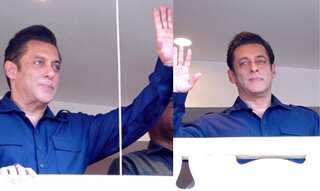 Salman Khan waves at fans gathered outside his Galaxy apartment on Eid