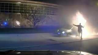 Caught on police dash cam! 84-year-old pulled out of burning car in the nick of time