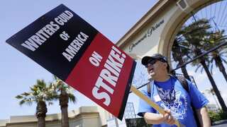 Late-night TV shows go dark as Hollywood writers strike for better pay