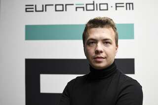 Dissident Belarusian journalist pulled off plane by Minsk gets 8 years in prison