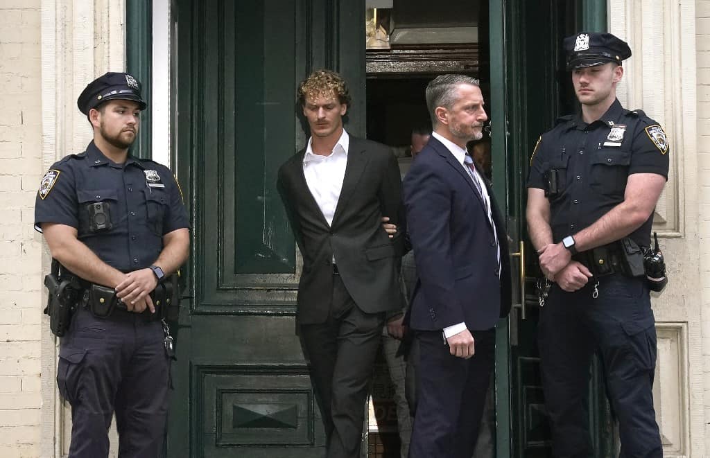 Former US marine who choked homeless man to death charged with manslaughter, released on bond 