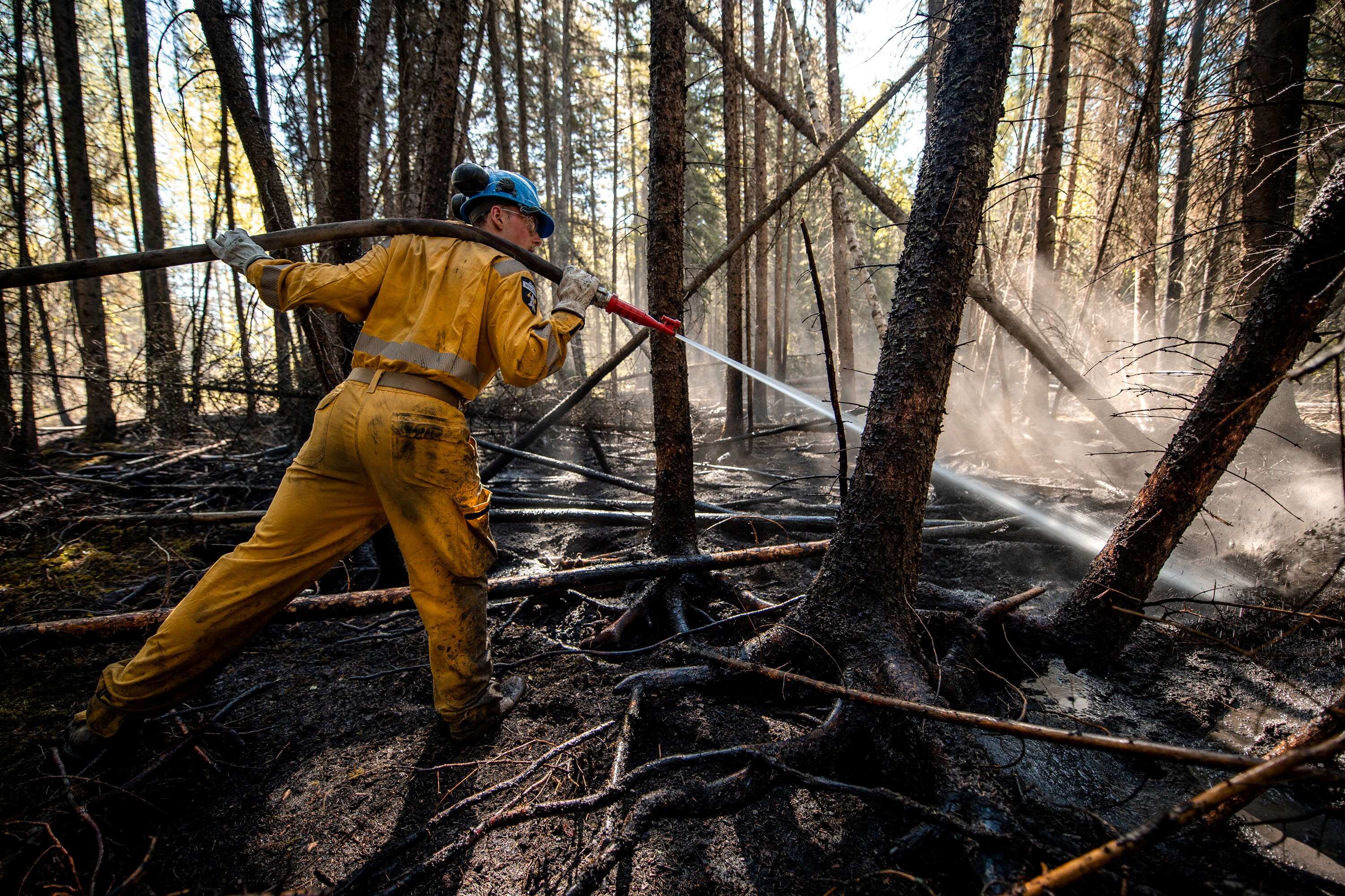 Firefighters tackle the flames