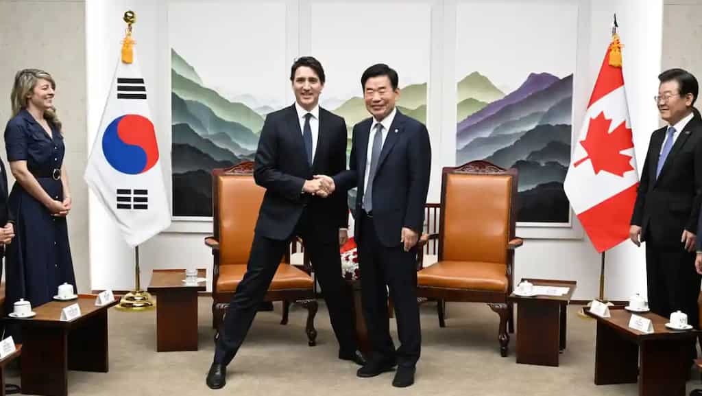 Trudeau’s ‘manner legs’ pose with Korean politician slammed as another gaffe by critics