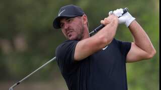 PGA Championship: Brooks Koepka takes lead at soggy Oak Field amid boos from spectators