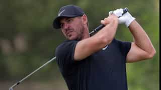 PGA Championship: Brooks Koepka takes lead at soggy Oak Field amid boos from spectators