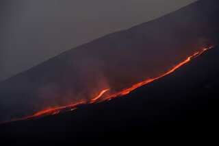 Italy's Mount Etna erupts, spews ash, forces airport to shutdown
