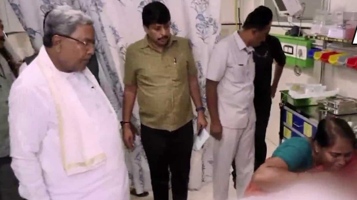 Woman drowns after car gets stuck in neck-deep water at Bengaluru underpass Woman drowns after car gets stuck in neck-deep water at Bengaluru underpass