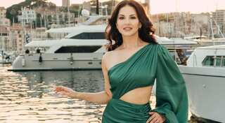 Kennedy-actress Sunny Leone debuts at Cannes in a green satin dress