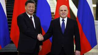 Xi Jinping offers support to Moscow on 'core interests' as Russian PM hails 'unprecedented' ties with China