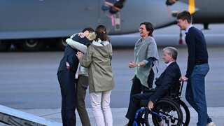 Aid worker arrives in Belgium after prisoner swap with Iranian diplomat