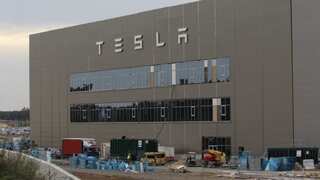 Stocks of EV makers Tesla and Rivian surge after beating Q2 sales estimate