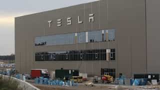 Stocks of EV makers Tesla and Rivian surge after beating Q2 sales estimate