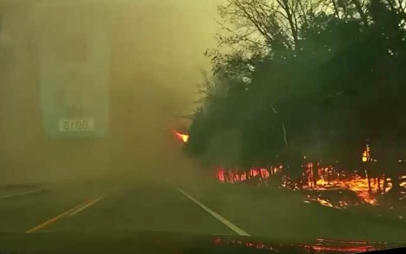 Watch: Dashcam video shows wildfire burning out of control in Canada