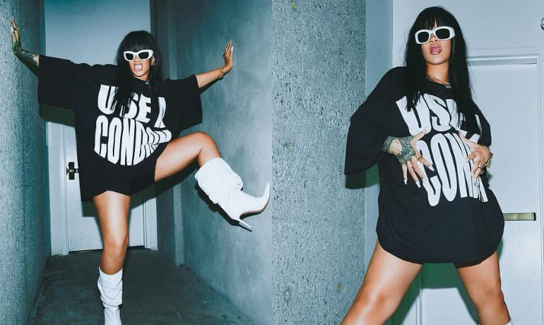 Pregnant Rihanna's chic oversized shirt has a message for her fans: 'Use a condom' Pregnant Rihanna's chic oversized shirt has a message for her fans: 'Use a condom'