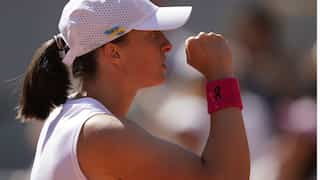 French Open: Iga Swiatek serves double bagel in 51-minute blitz vs Wang Xinyu