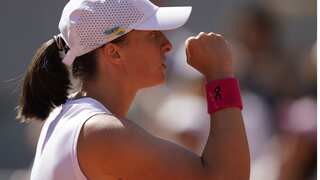 French Open: Iga Swiatek serves double bagel in 51-minute blitz vs Wang Xinyu