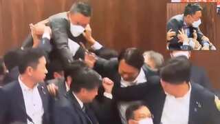Watch | Lawmakers spar and scuffle in Japanese parliament over controversial refugee bill