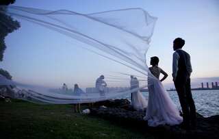 China population crisis: Newlyweds to receive cash reward if bride is under 25