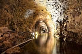 Tour boat overturns during underground cave ride along Erie Canal in New York, one dies