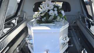 Man fakes his own death, turns up dramatically at his funeral in a helicopter
