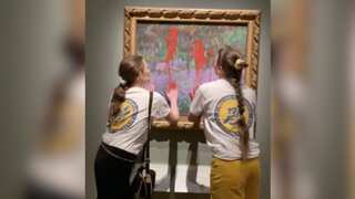 WATCH | Climate activists smear paint over Monet painting in Stockholm
