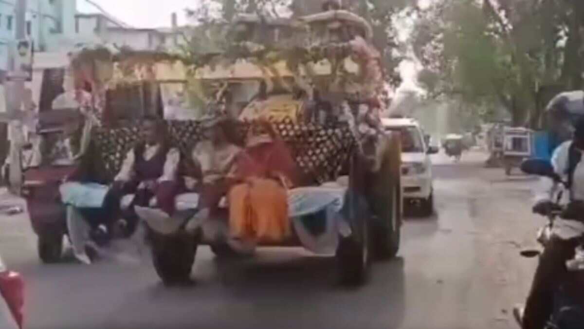 Watch | Groom takes bride home on a decorated bulldozer in Indian state of Jharkhand Watch | Groom takes bride home on a decorated bulldozer in Indian state of Jharkhand