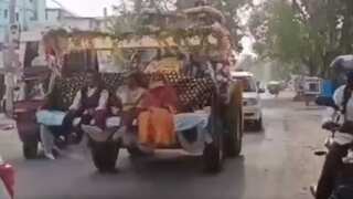 Watch | Groom takes bride home on a decorated bulldozer in Indian state of Jharkhand