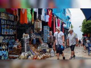 Tunisia hopeful of economy revival as tourists make their way to the country