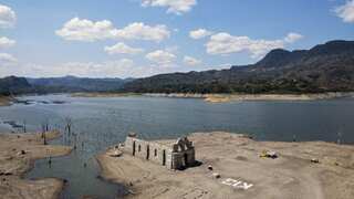 Locals left stunned as 16th-century church emerges from dried up Mexican reservoir