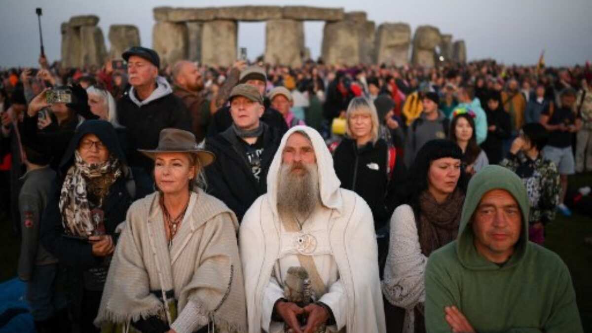 Revellers watch the sunrise