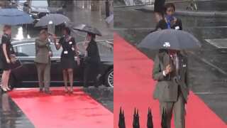 Pak PM Shehbaz Sharif takes away umbrella from woman, leaving her to walk behind in rain. Watch!