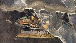 A pizza history | Archaeologists discover painting of pizza's 'ancestor' in ruins of Pompeii