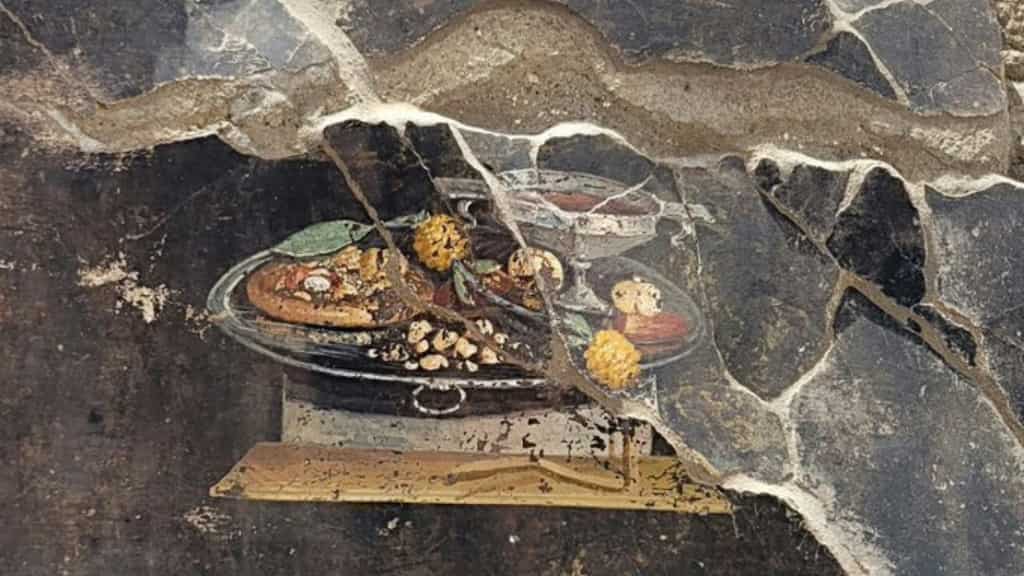 A pizza history | Archaeologists discover painting of pizza's 'ancestor' in ruins of Pompeii