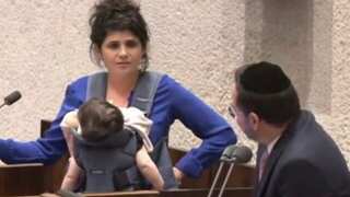 Israel parliament prevents woman member holding baby from speaking