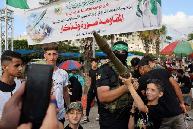 ‘Come and take selfies,’ Hamas militants put their weapons on public display for first time ‘Come and take selfies,’ Hamas militants put their weapons on public display for first time