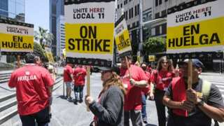 Hotel workers in LA go on strike demanding higher wages