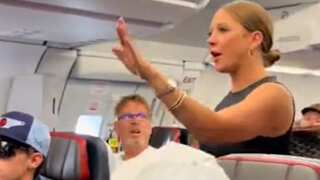 WATCH | Woman's fiery outburst on American Airlines flight over 'not real' passenger