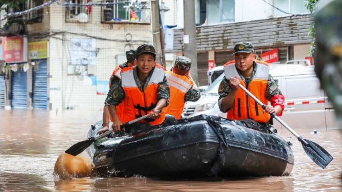Rescue workers bring people to safety