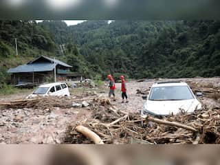 Torrential rains hit several Chinese cities, cause death and destruction