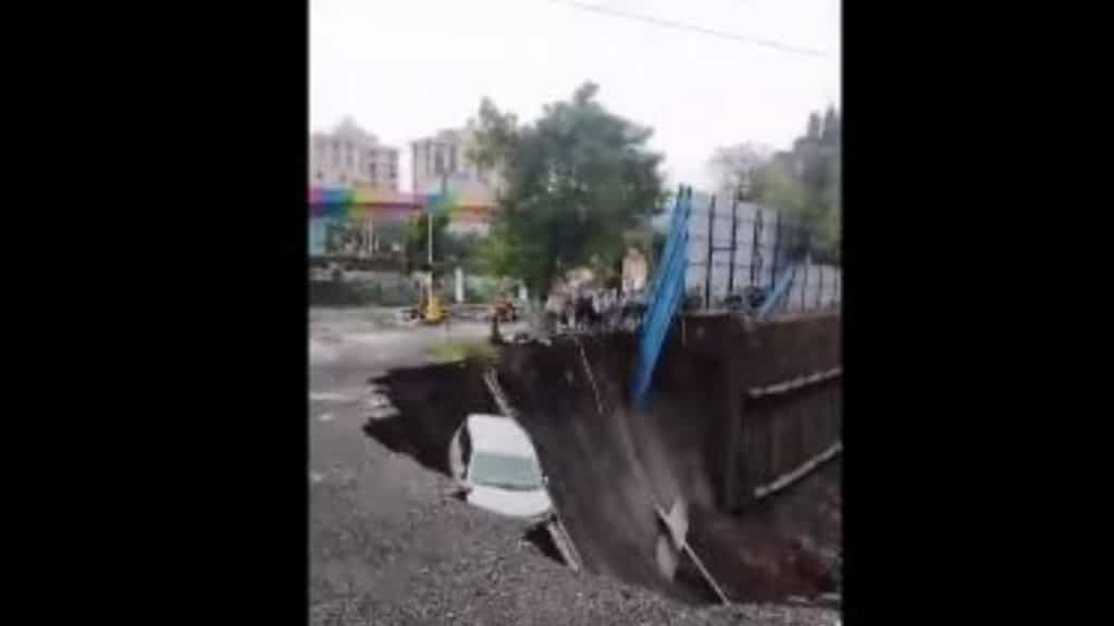 Video: Road caves in during Mumbai rains, several vehicles stuck after falling in pit