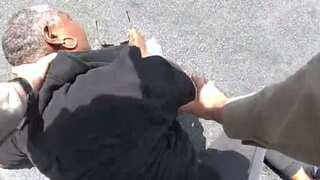 WATCH | LA police officer throws woman to ground, pepper-sprays her face in viral video
